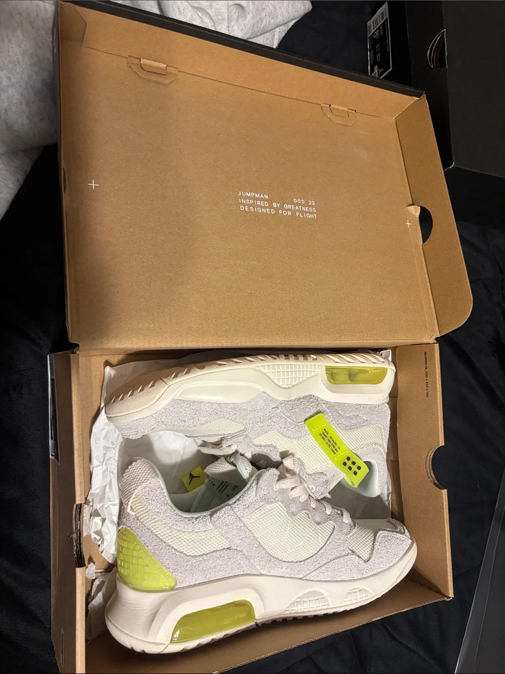 Jordan Neutral White and Lime Green Accent Sneakers